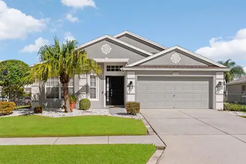 7619 CRESCENT PALM DR — home for sale
